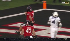 Behren Morton scrambles for a nine-yard TD to give Texas Tech an early lead vs. TCU